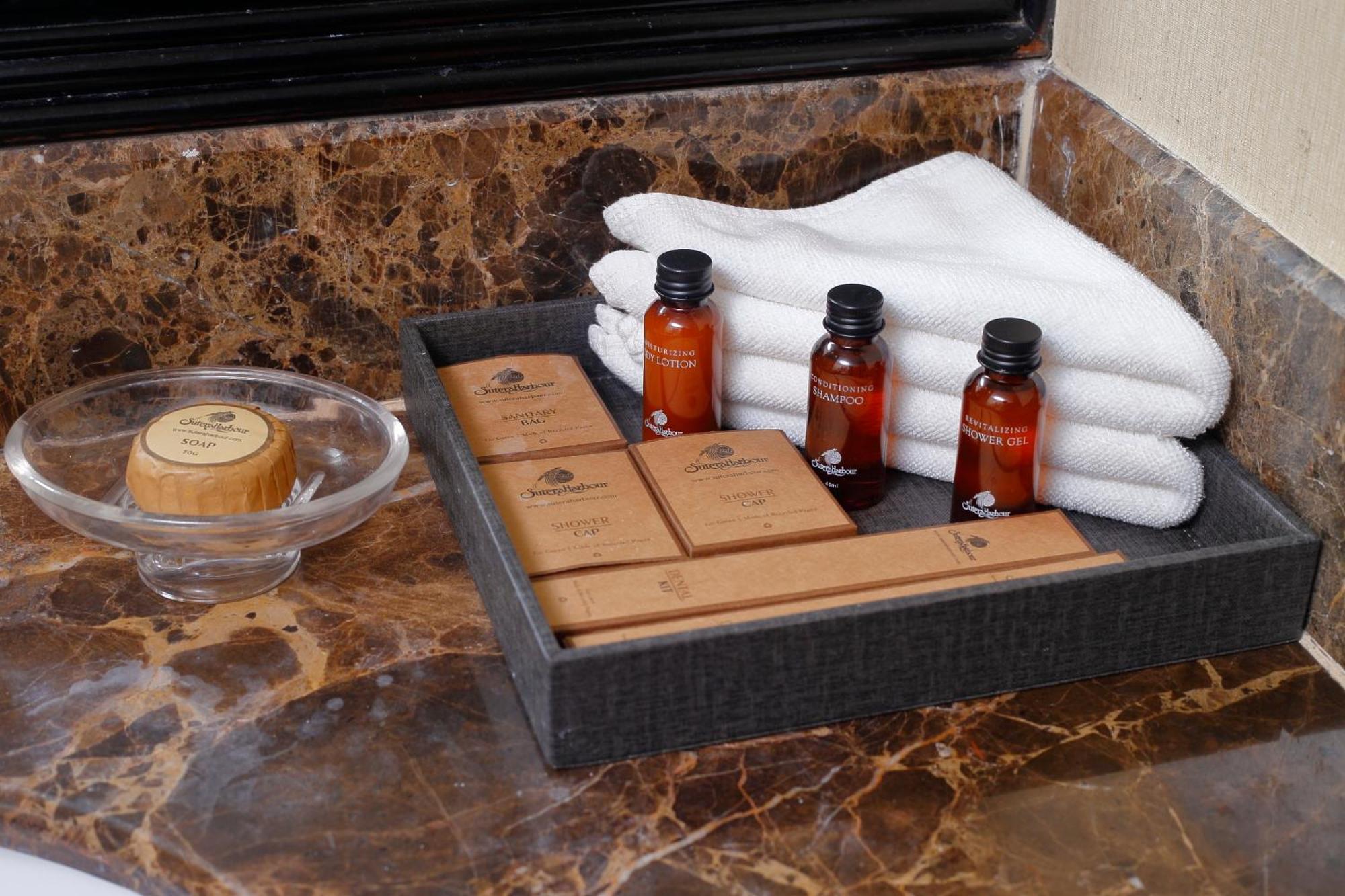Hotel The Pacific Sutera Kota Kinabalu Zewnętrze zdjęcie A selection of toiletries in a hotel bathroom
